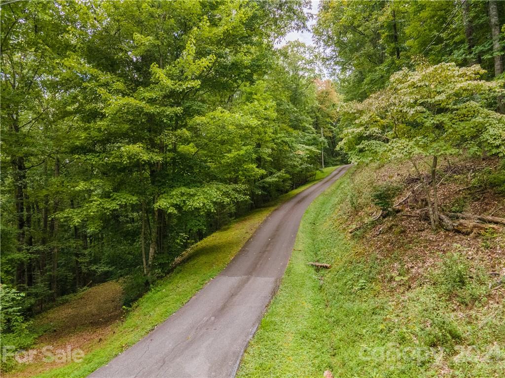 20-21 Wooten Ridge Franklin, NC 28734 - Photo 12 of 16 a view of a lake with a yard