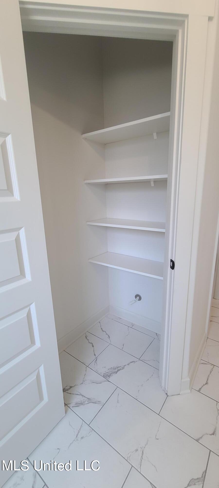 431 Ruskin Loop Hernando, MS 38632 - Photo 36 of 48 Linen Closet Primary BA