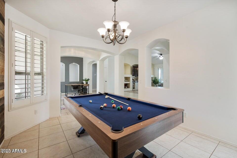 2624 West Summerside Road Phoenix, AZ 85041 - Photo 14 of 31 a room with pool table and windows
