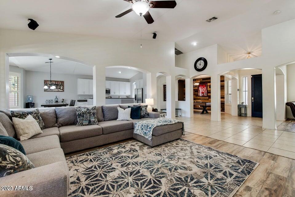 2624 West Summerside Road Phoenix, AZ 85041 - Photo 15 of 31 a living room with furniture and a rug