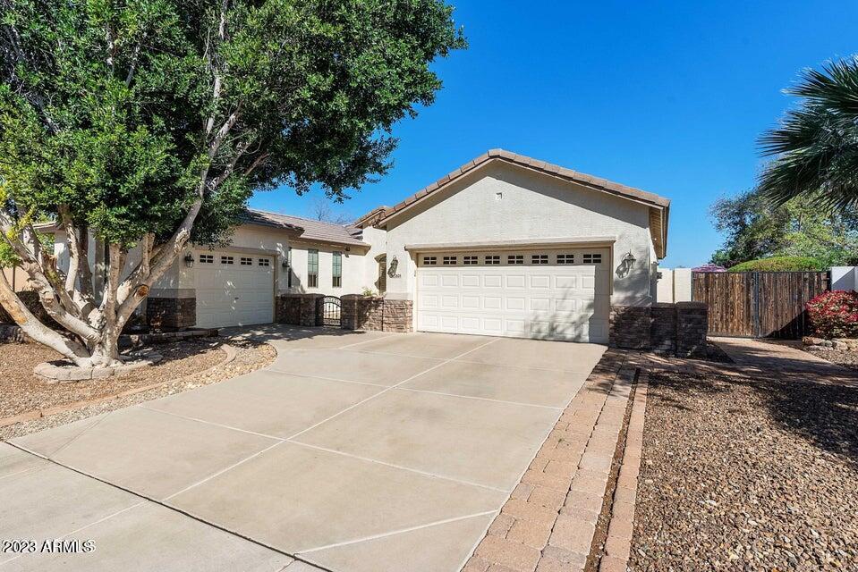 2624 West Summerside Road Phoenix, AZ 85041 - Photo 2 of 31 a front view of a house with a yard