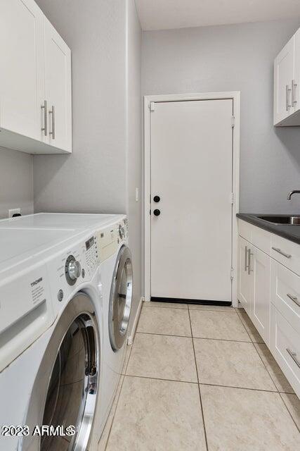 2624 West Summerside Road Phoenix, AZ 85041 - Photo 24 of 31 a utility room with dryer and washer
