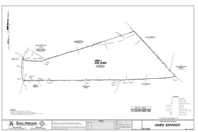 a view of a field with an outdoor space