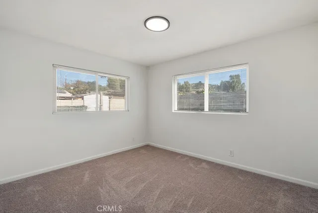 a bathroom with a tub a sink and shower