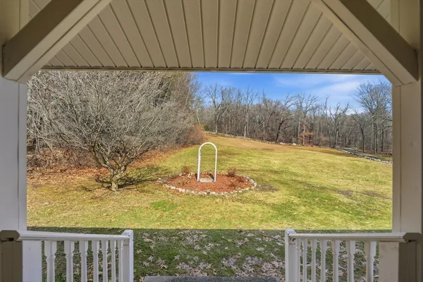 a view of a chairs on the deck