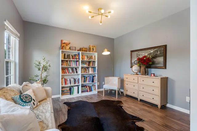 a bedroom with a bed and furniture