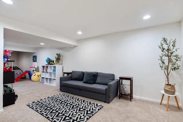 a living room with furniture and a couch