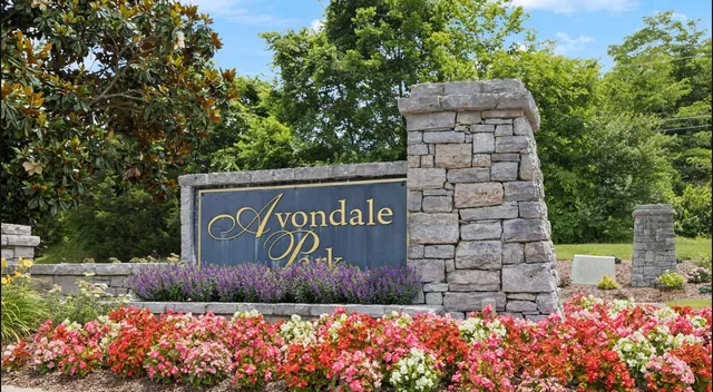 a sign that is next to a road