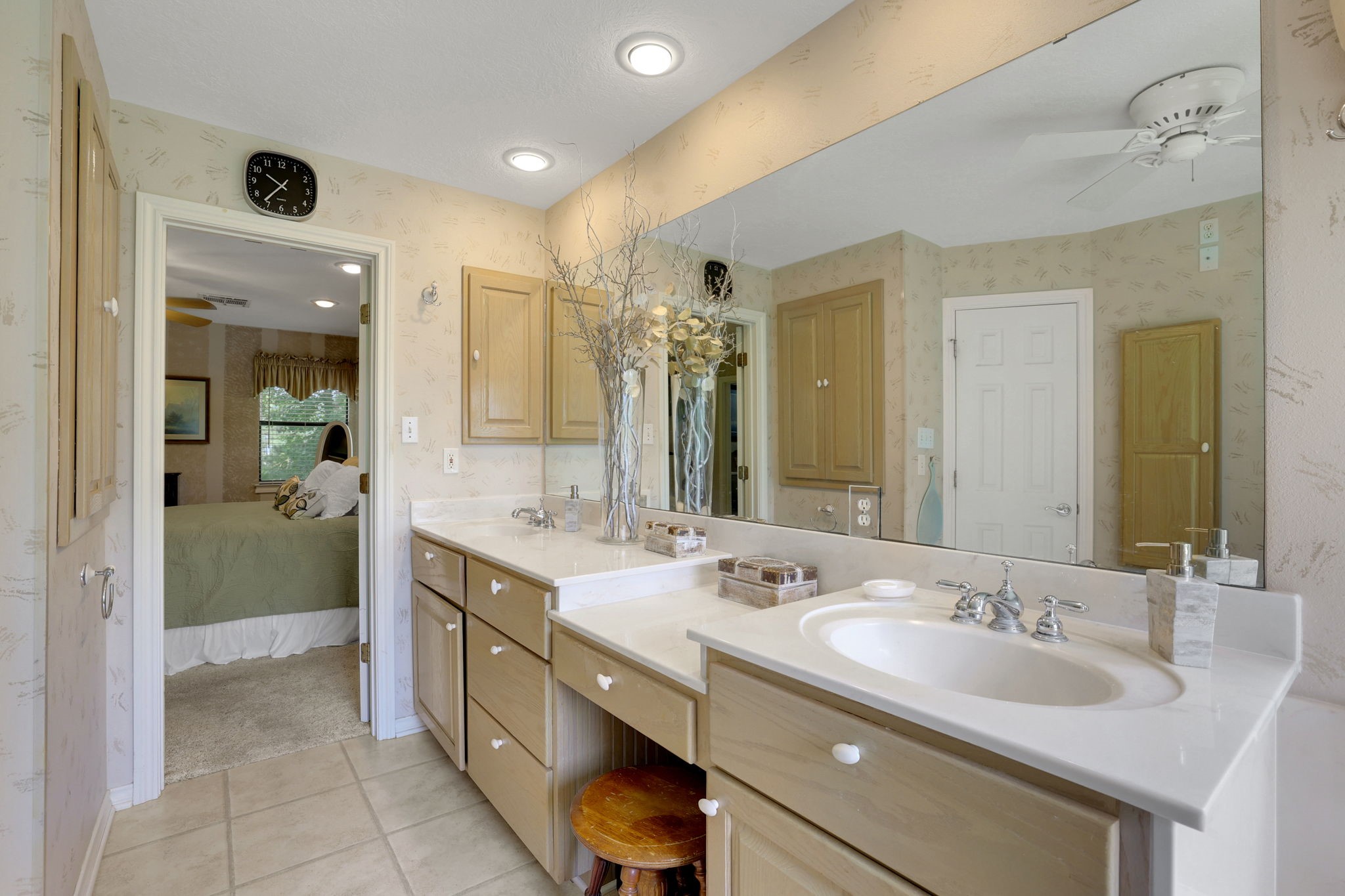 780 Hickory Ridge Drive Coldspring, TX 77331 - Photo 22 of 40 The primary ensuite has dual sinks and vanity area