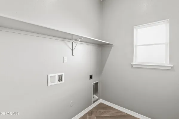 a view of a room with racks on the wall