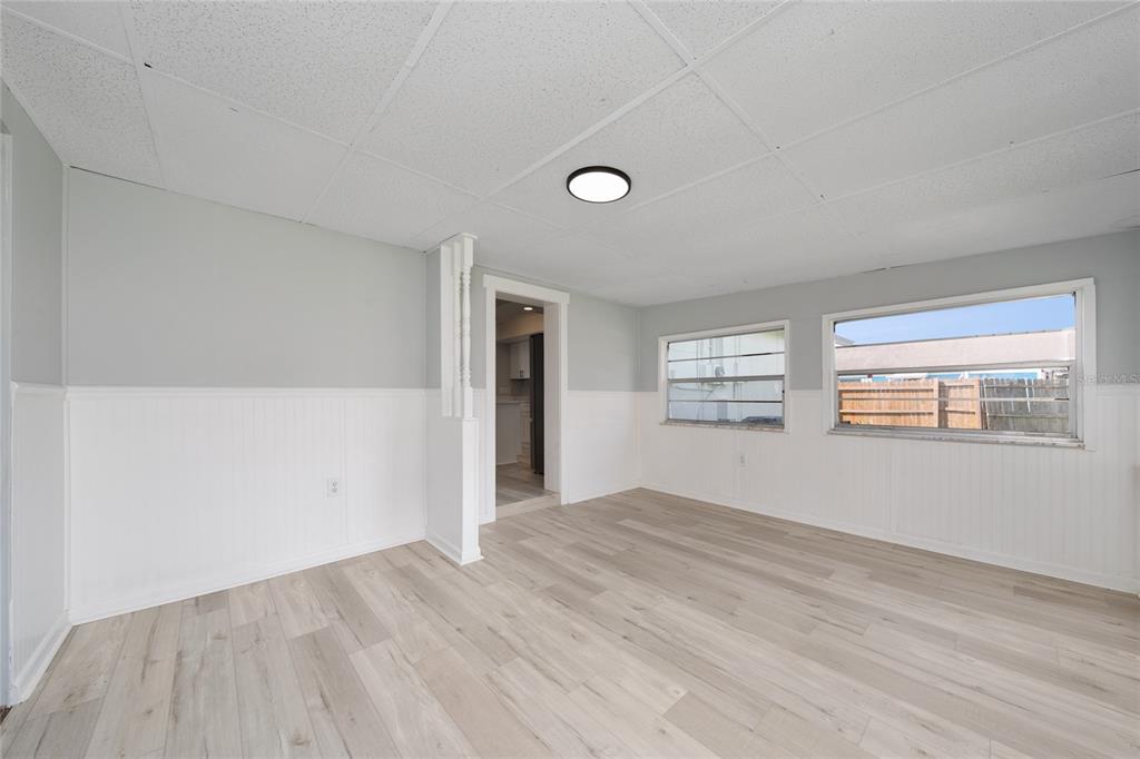 1034 Falcon Street Deltona, FL 32725 - Photo 16 of 36 a view of an empty room with a window