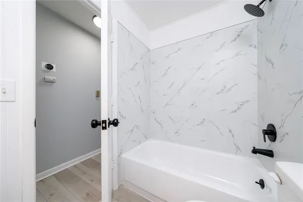 a bathroom with a bathtub