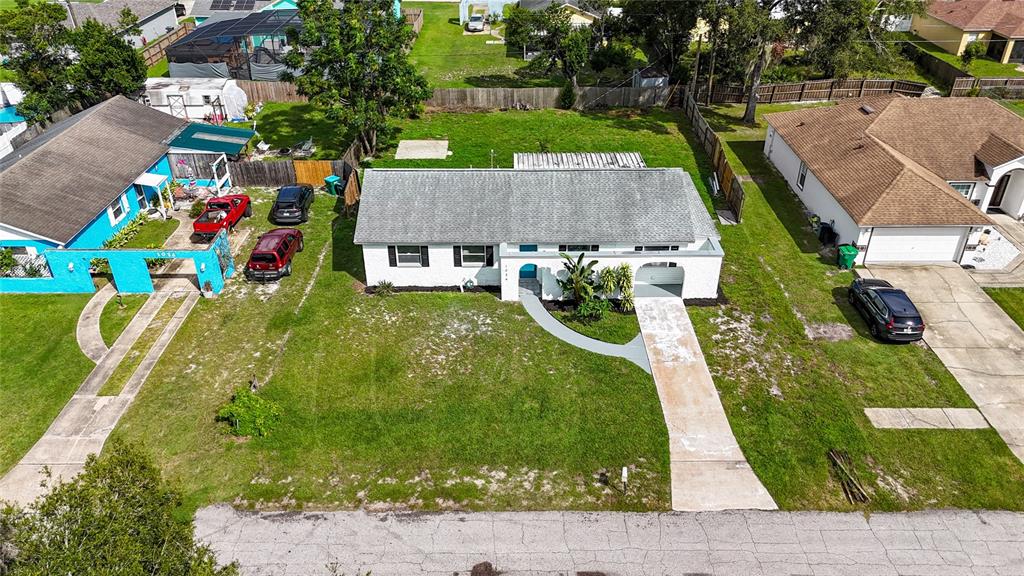 1034 Falcon Street Deltona, FL 32725 - Photo 27 of 36 a view of a garden with plants