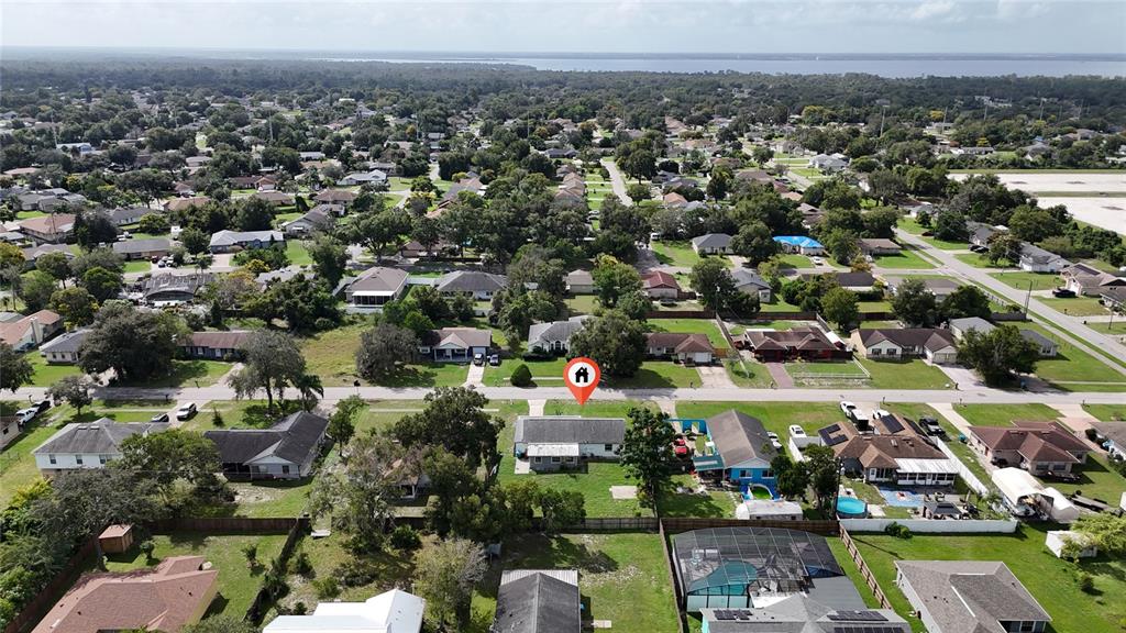 1034 Falcon Street Deltona, FL 32725 - Photo 36 of 36 an aerial view of a city