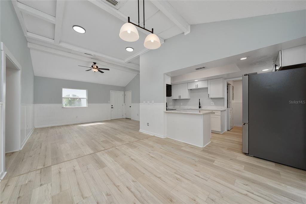1034 Falcon Street Deltona, FL 32725 - Photo 8 of 36 a view of a kitchen with electric appliances