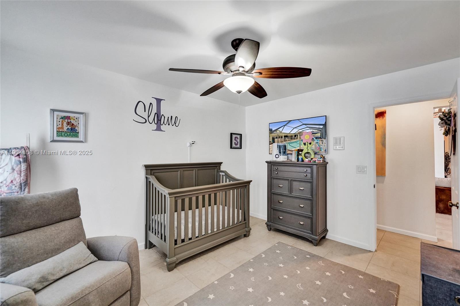 1501 Northwest 99th Avenue Plantation, FL 33322 - Photo 24 of 45 a room with furniture and a ceiling fan