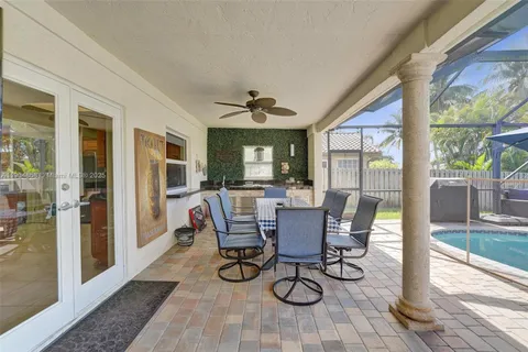 a view of a dining room with furniture wooden floor and a rug