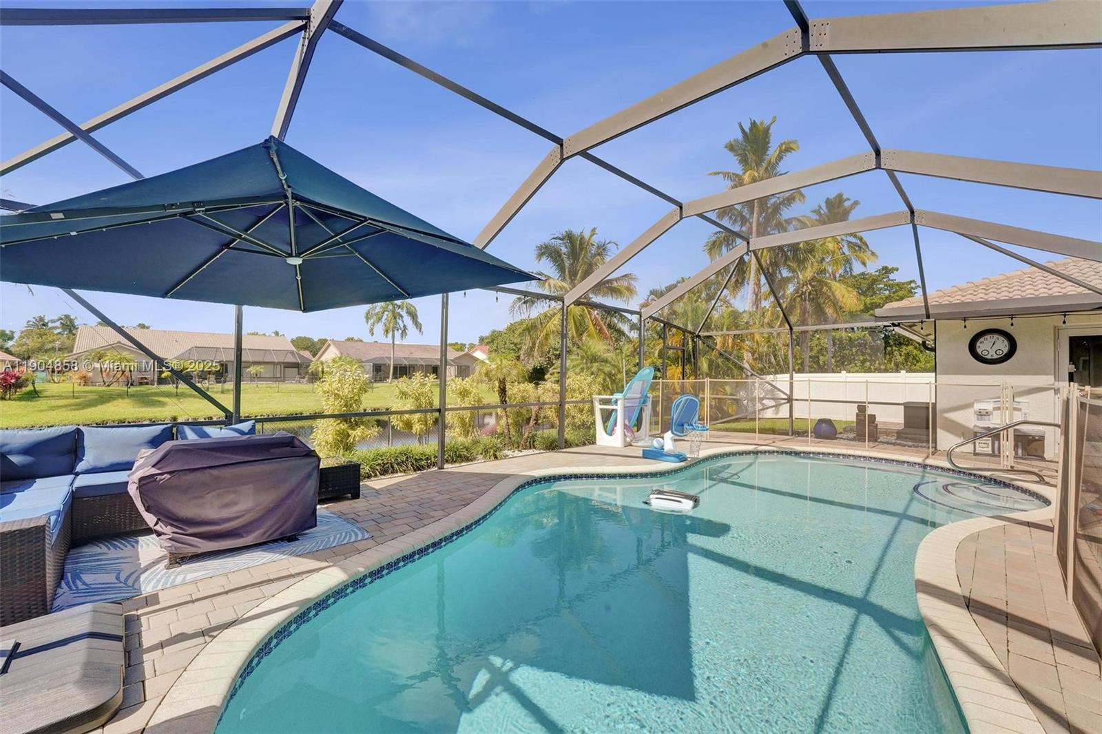 1501 Northwest 99th Avenue Plantation, FL 33322 - Photo 35 of 45 a room with lots of potted plants