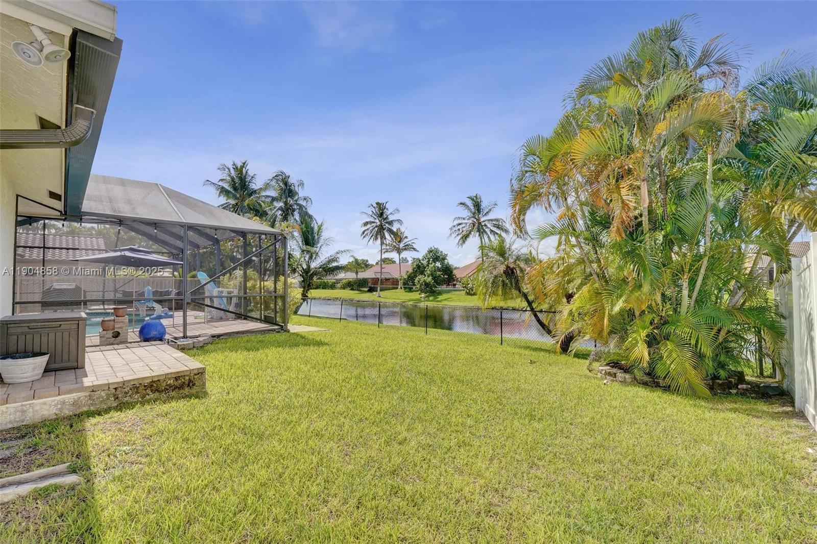 1501 Northwest 99th Avenue Plantation, FL 33322 - Photo 38 of 45 a view of back yard of the house
