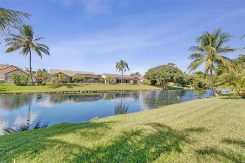 a view of a lake with a house