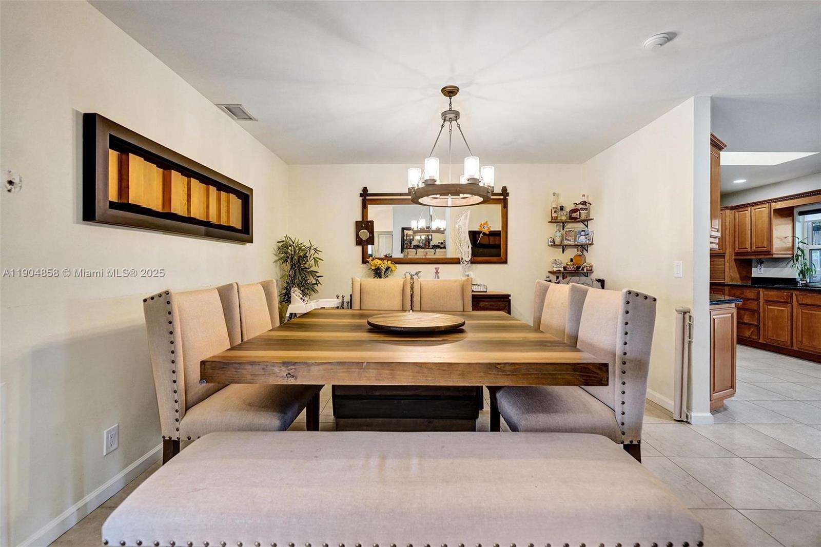 1501 Northwest 99th Avenue Plantation, FL 33322 - Photo 8 of 45 a view of a dining room with furniture