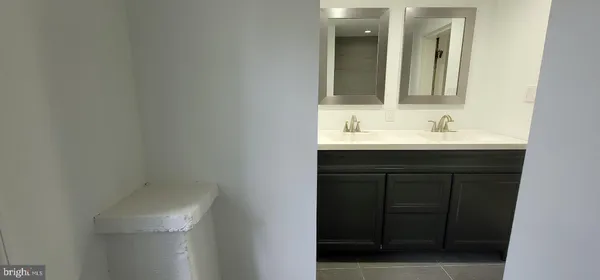 a bathroom with a sink and a shower
