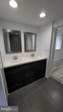 a bathroom with a bath tub