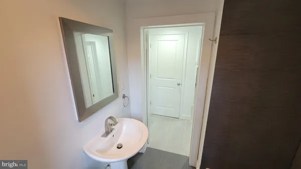 an empty room with wooden floor