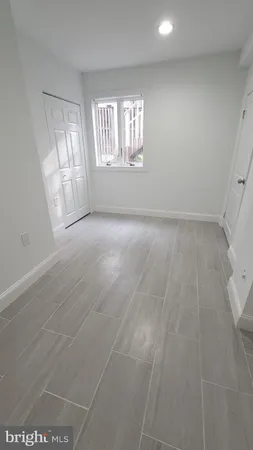 a kitchen with stainless steel appliances kitchen island sink refrigerator and stove