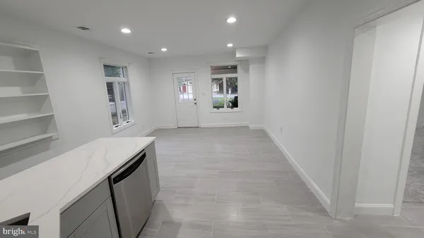 a view of a hallway with workspace