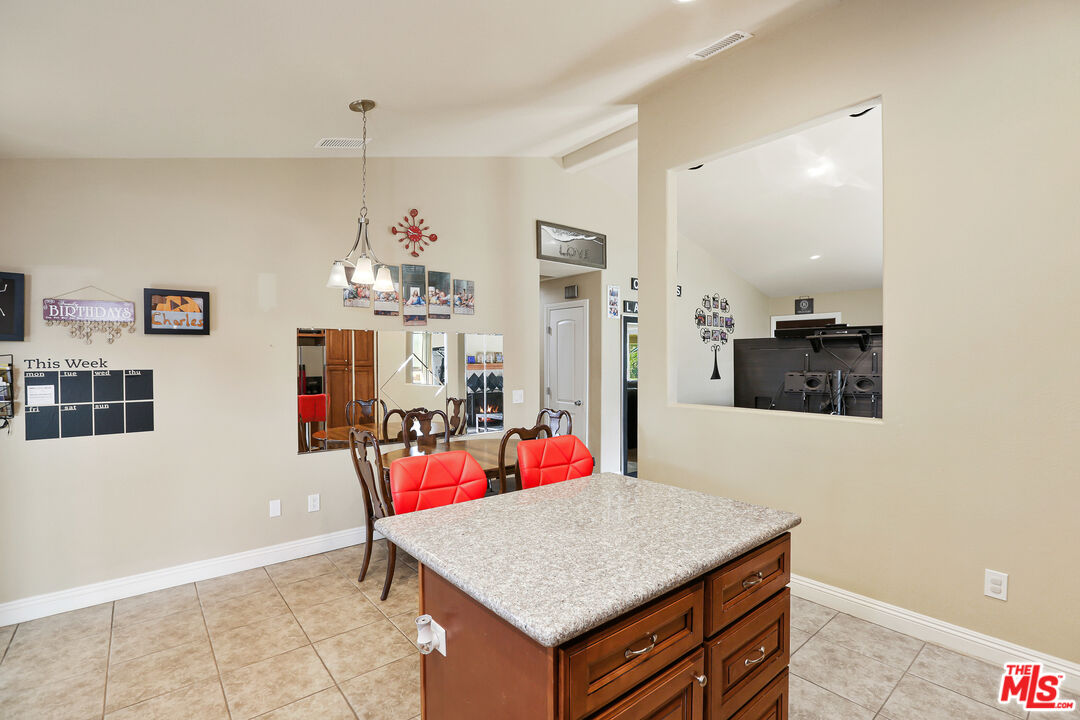 9225 Flax Place Riverside, CA 92503 - Photo 13 of 35 a room with furniture and window