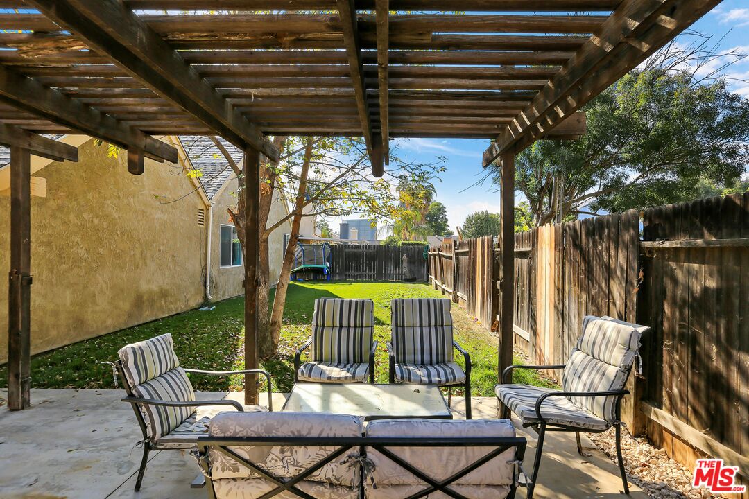 9225 Flax Place Riverside, CA 92503 - Photo 27 of 35 a view of a chairs and table in patio