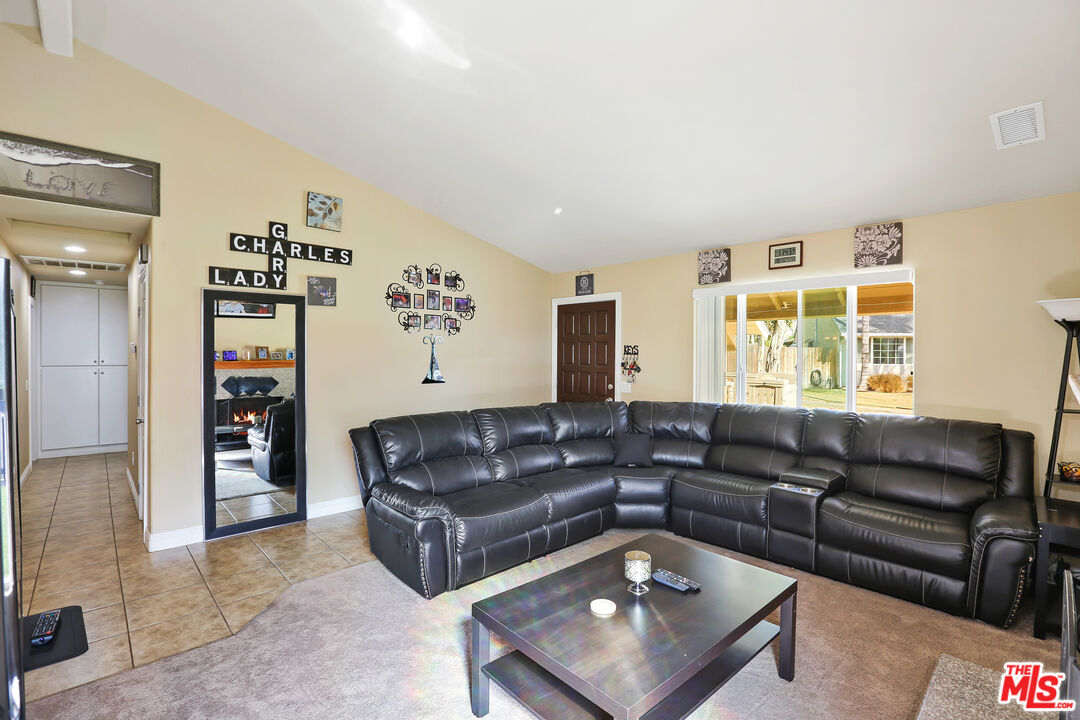 9225 Flax Place Riverside, CA 92503 - Photo 4 of 35 a living room with furniture and a window