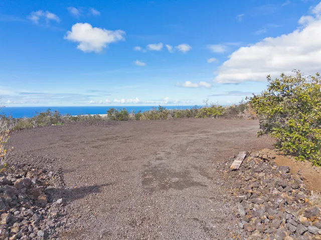 a view of beach and sunset