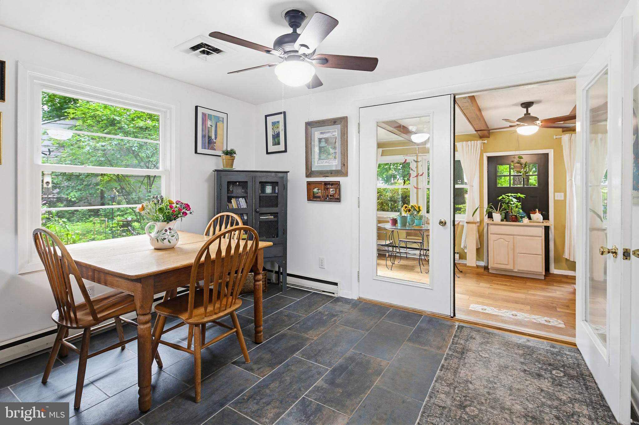 919 Blue Ridge Drive Annapolis, MD 21409 - Photo 20 of 30 a view of a dining room with furniture window and outside view