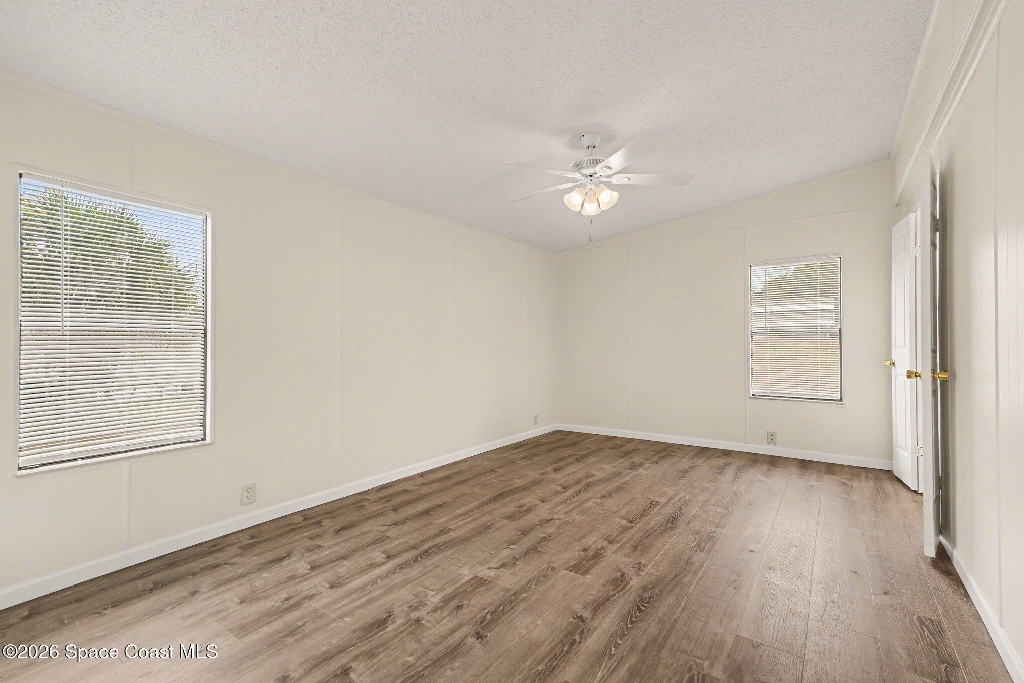 604 Breezeway Drive Cocoa, FL 32926 - Photo 15 of 26 Primary bedroom with natural light
