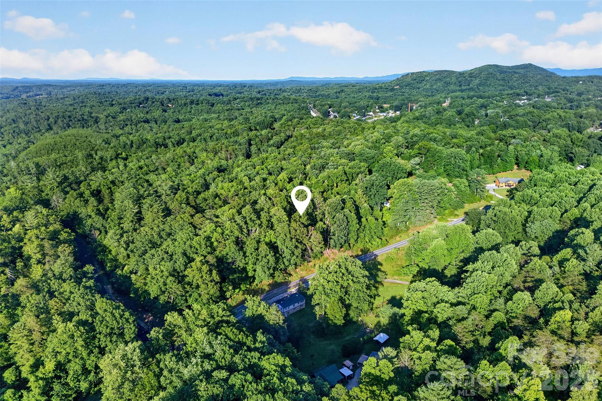 0 Yancey Road Marion, NC 28752 - Photo 1 of 32 a view of a lush green forest with lots of trees