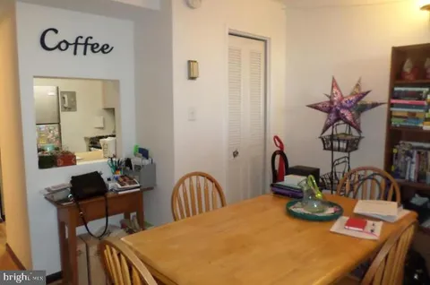 a view of a dining room with furniture
