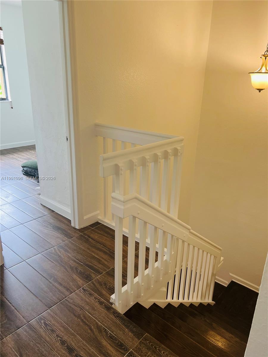 11219 Southwest 234 Terrace, Unit 11219 Homestead, FL 33032 - Photo 16 of 16 a view of wooden floor with entryway