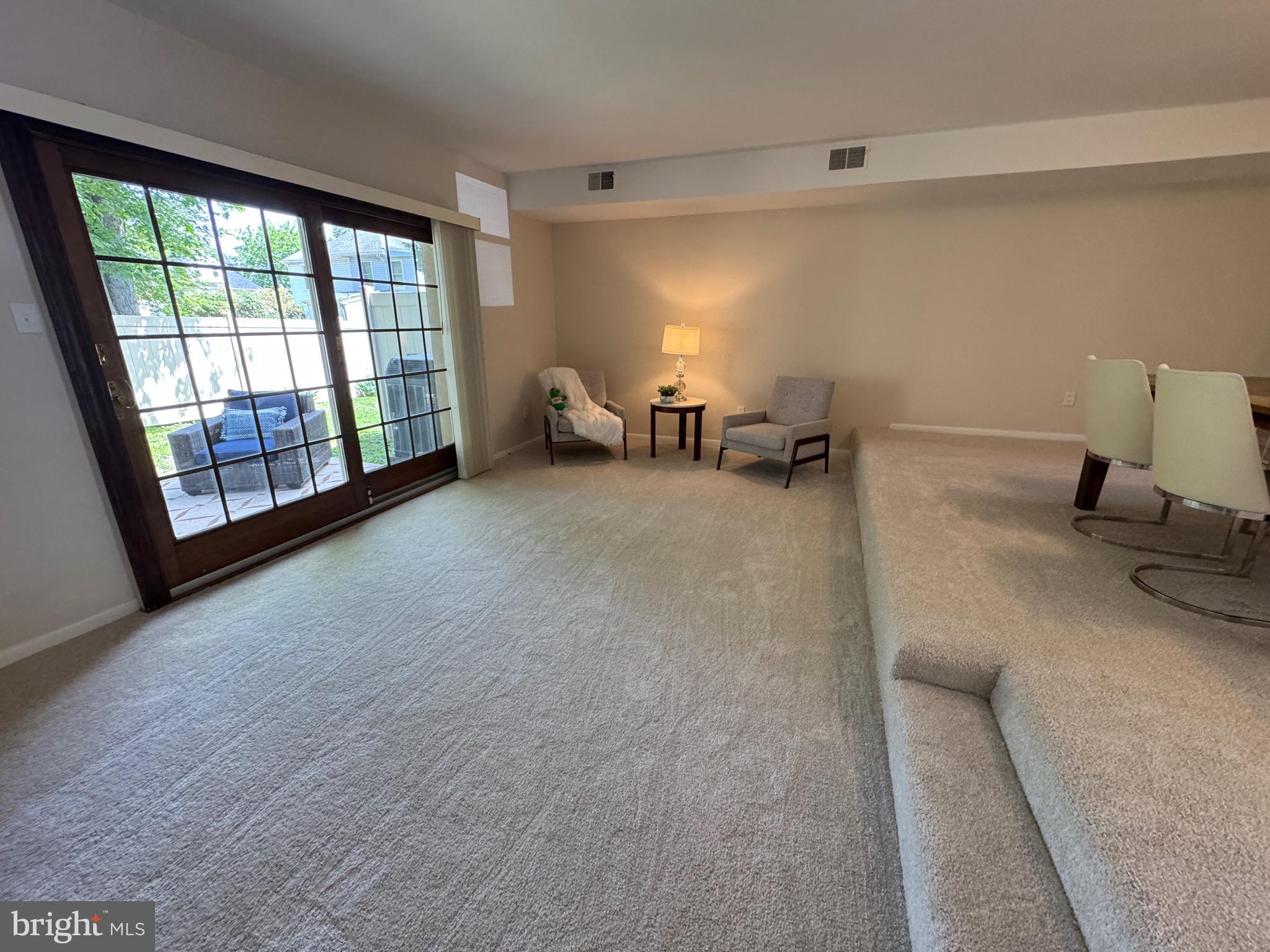 315 South Valley Forge Road, Unit 7 Devon, PA 19333 - Photo 9 of 26 a room with furniture and a large window