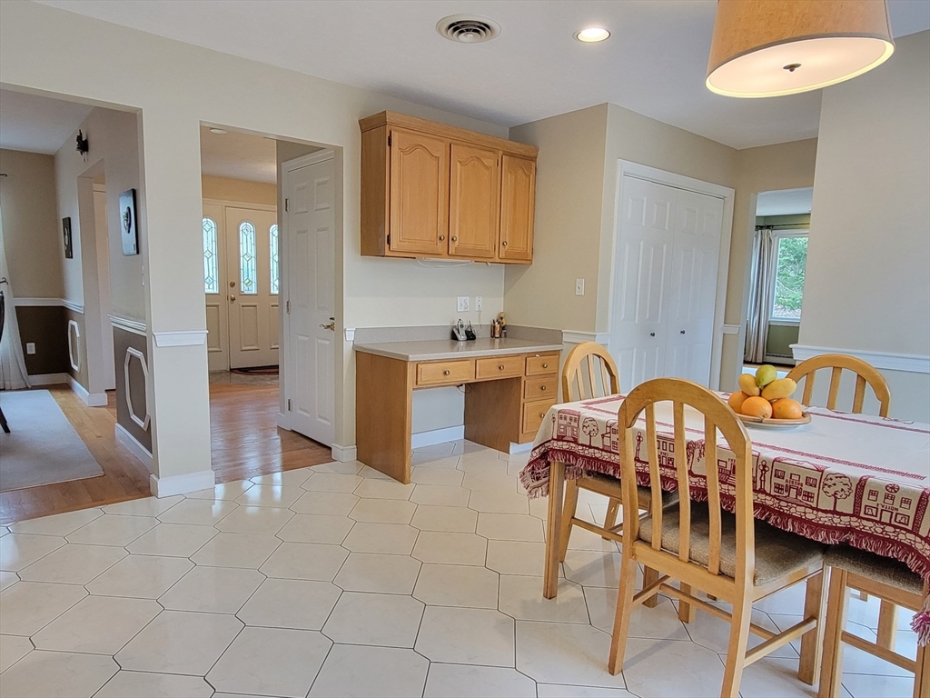 11 Femia Road Ashland, MA 01721 - Photo 13 of 42 a kitchen with granite countertop a sink cabinets and stainless steel appliances