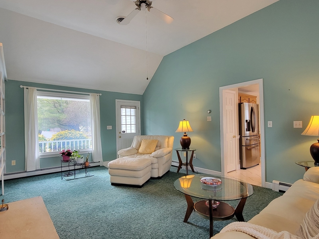 11 Femia Road Ashland, MA 01721 - Photo 19 of 42 a living room with furniture and a wooden floor