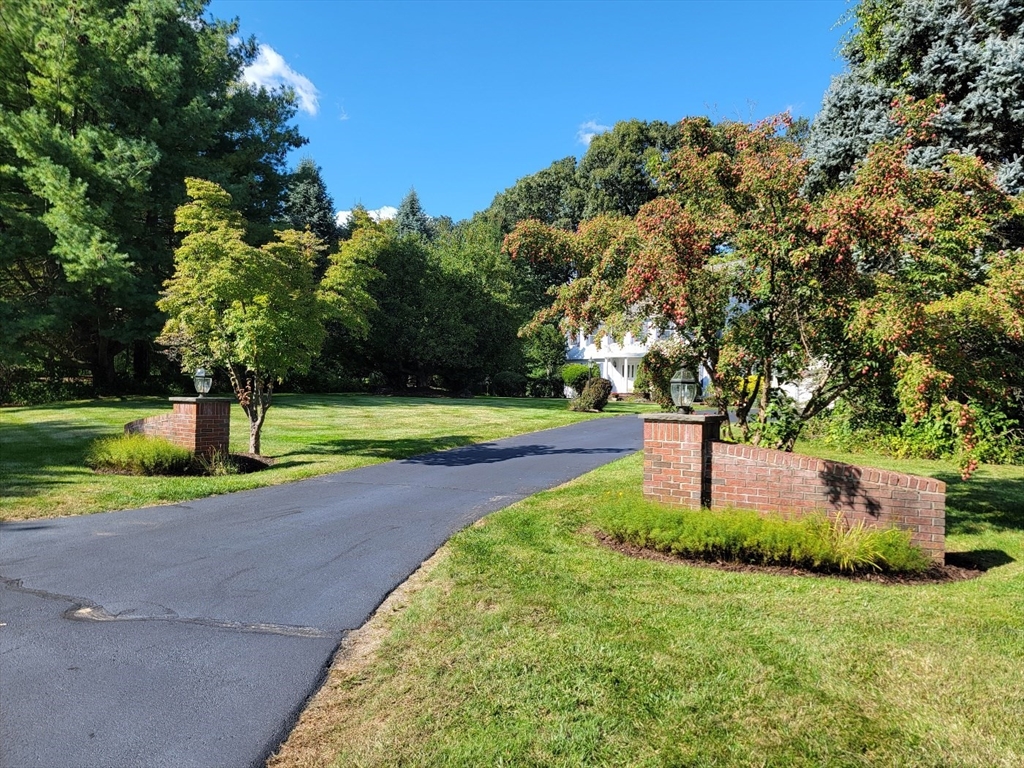 11 Femia Road Ashland, MA 01721 - Photo 2 of 42 a front view of a house with a yard