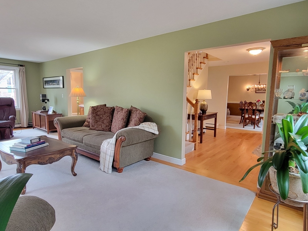 11 Femia Road Ashland, MA 01721 - Photo 23 of 42 a living room with furniture and wooden floor