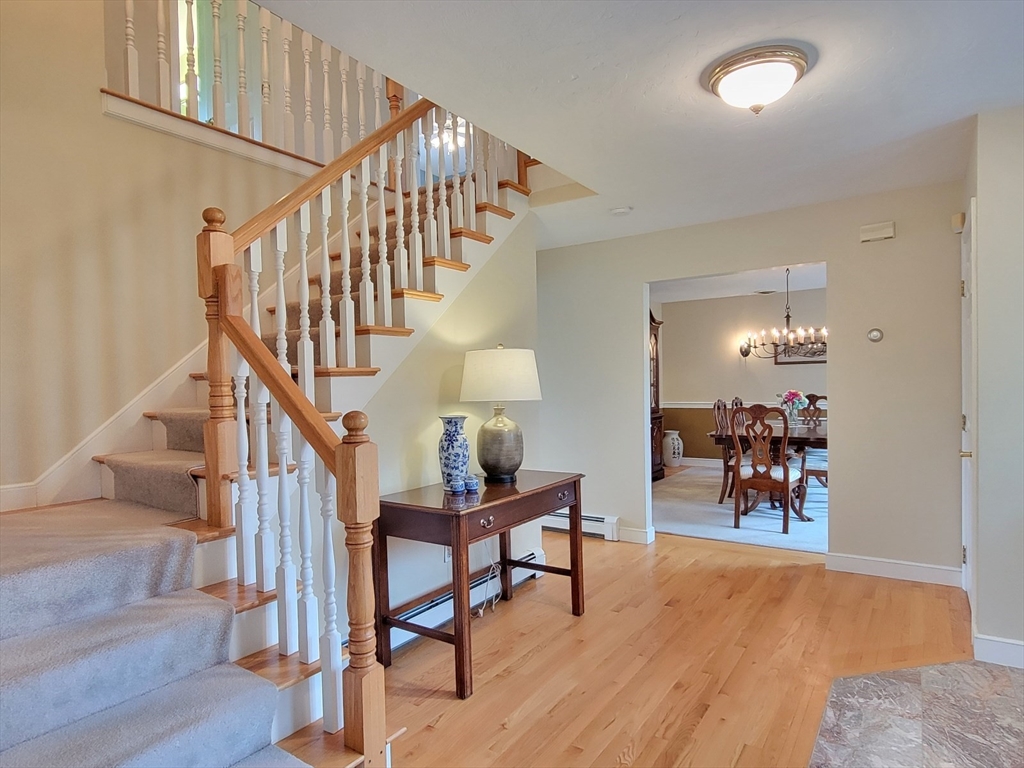 11 Femia Road Ashland, MA 01721 - Photo 25 of 42 a view of a livingroom with furniture and hardwood floor