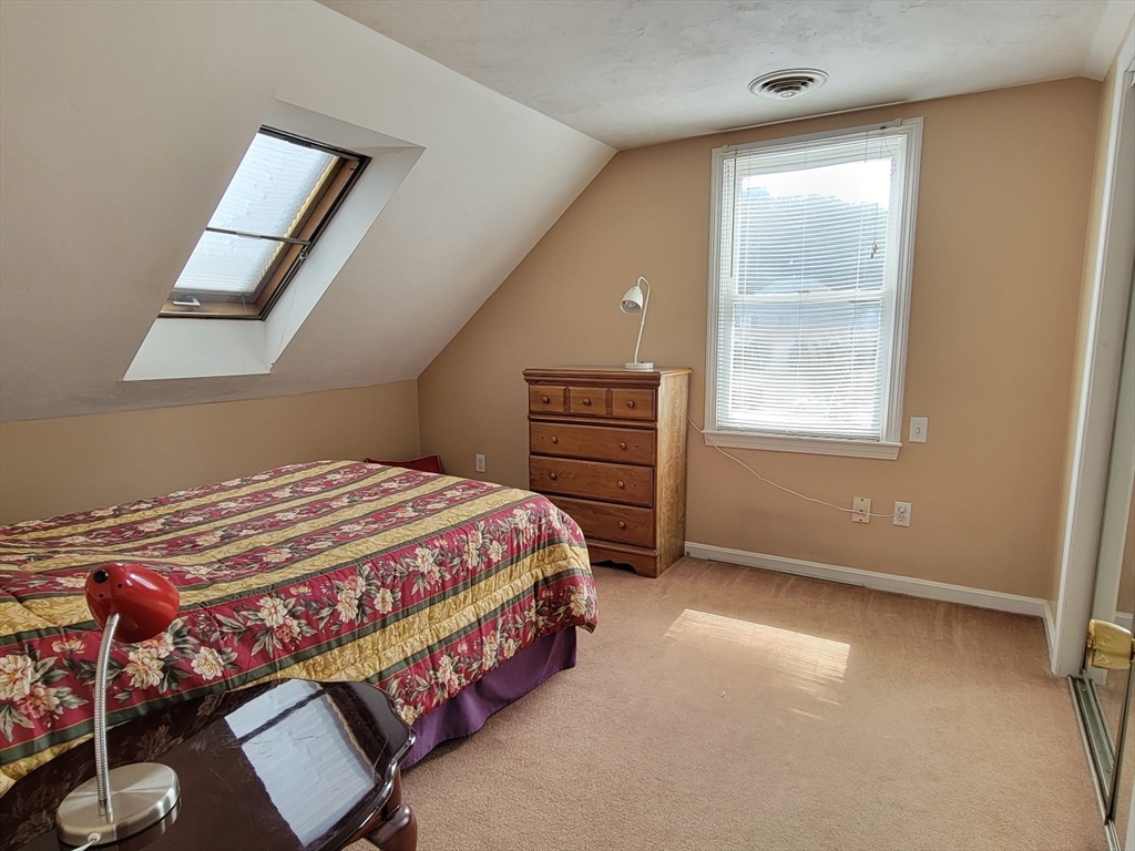 11 Femia Road Ashland, MA 01721 - Photo 40 of 42 a bedroom with a bed and a window