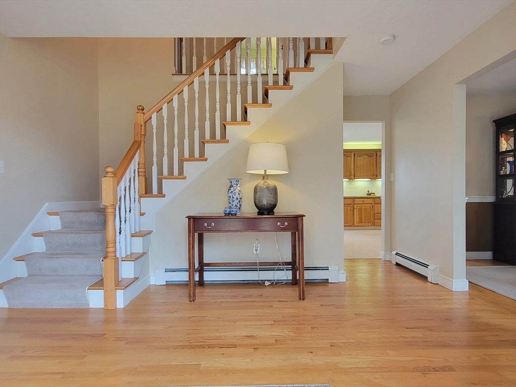 11 Femia Road Ashland, MA 01721 - Photo 8 of 42 a view of entryway and hall with wooden floor