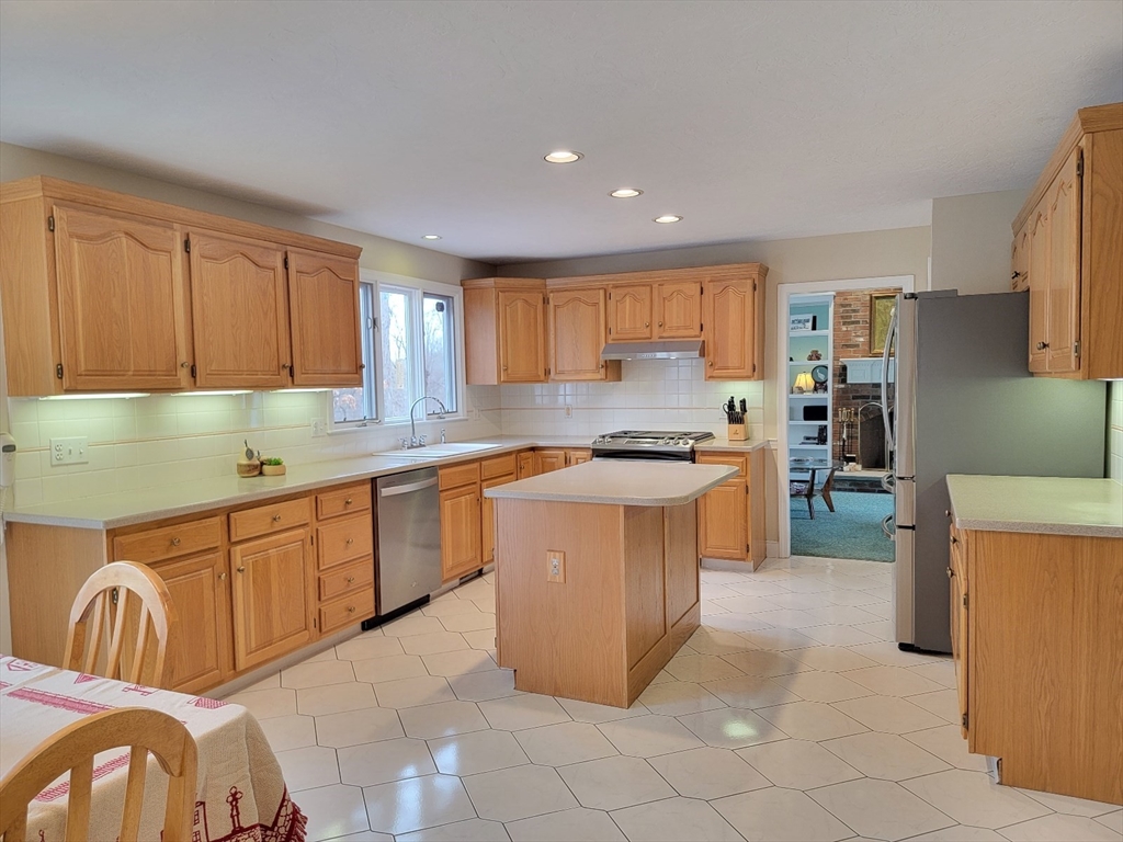 11 Femia Road Ashland, MA 01721 - Photo 10 of 42 a kitchen with stainless steel appliances granite countertop a stove a sink dishwasher and a refrigerator