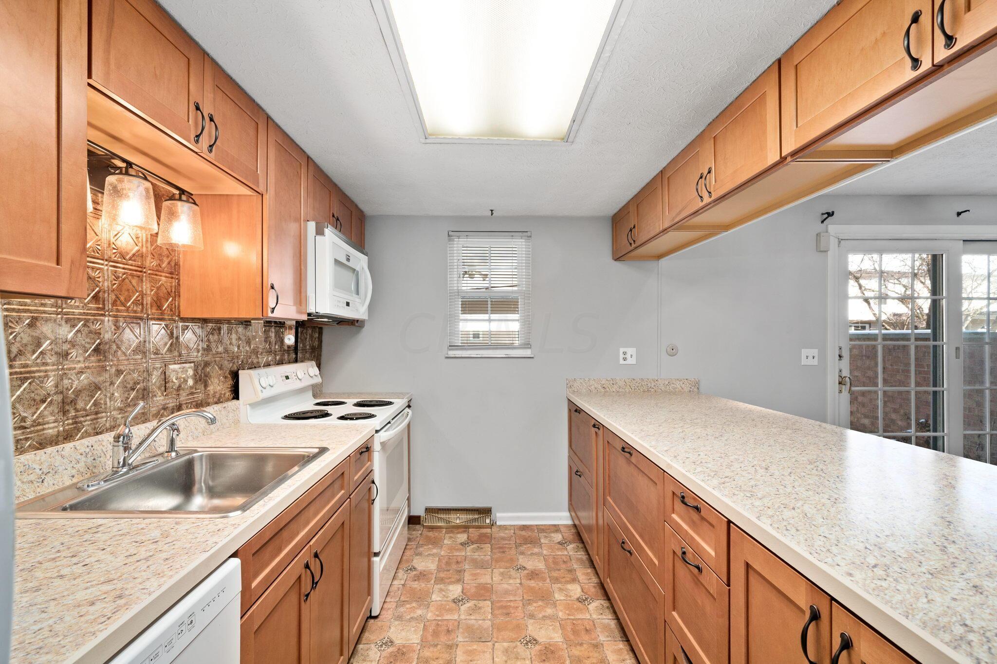 5123 Ranstead Court Columbus, OH 43220 - Photo 15 of 48 lots of light - lots of cabinets and lots of countertop