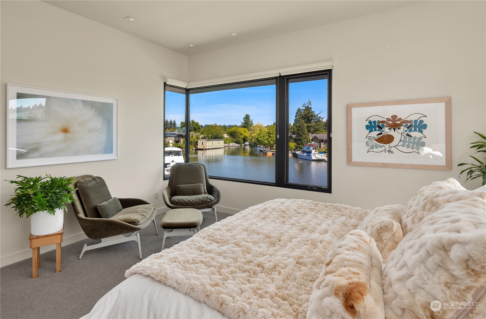 85 Cascade Key Bellevue, WA 98006 - Photo 27 of 37 a bedroom with furniture and a large window